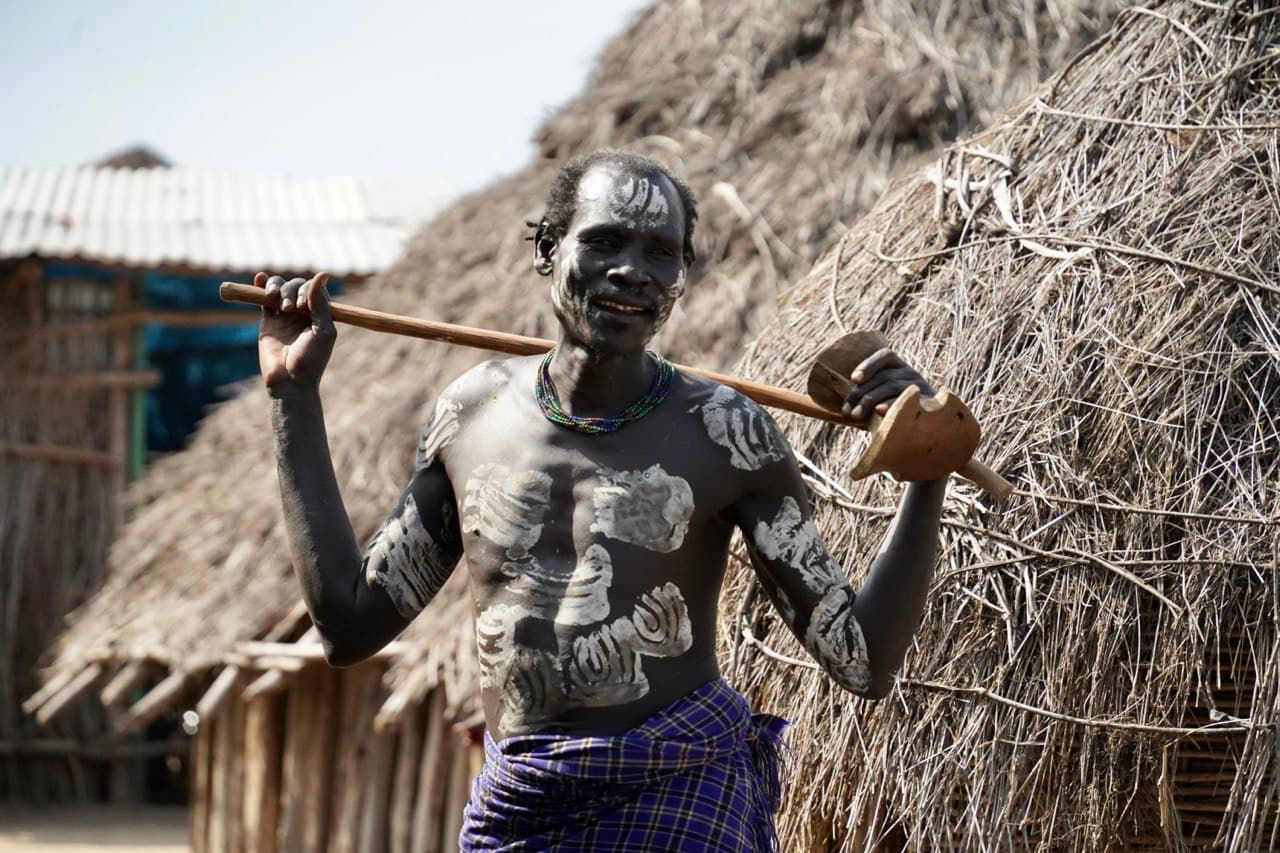 Karo man with body paint in a Lower Omo village, Ethiopia