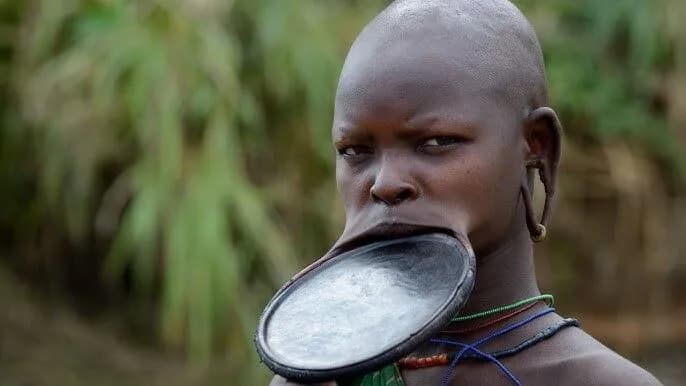 Mursi community member known for lip-plate tradition in the Lower Omo Valley, Ethiopia