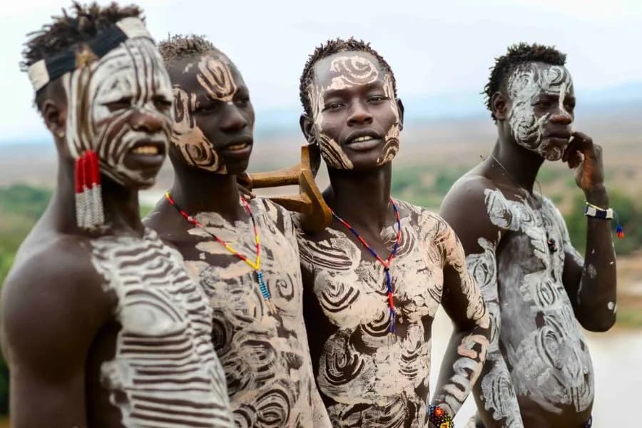 Surma (Suri) community members with traditional adornment in southwestern Ethiopia