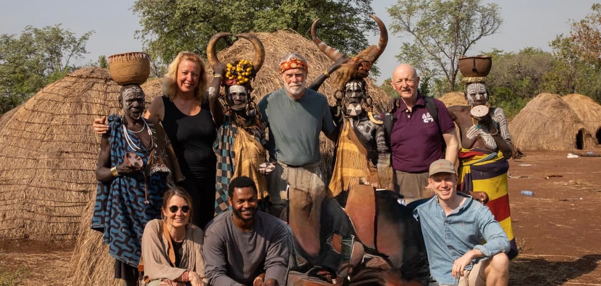 Travelers with a local community in Ethiopia on a Lalibela Expeditions cultural tour
