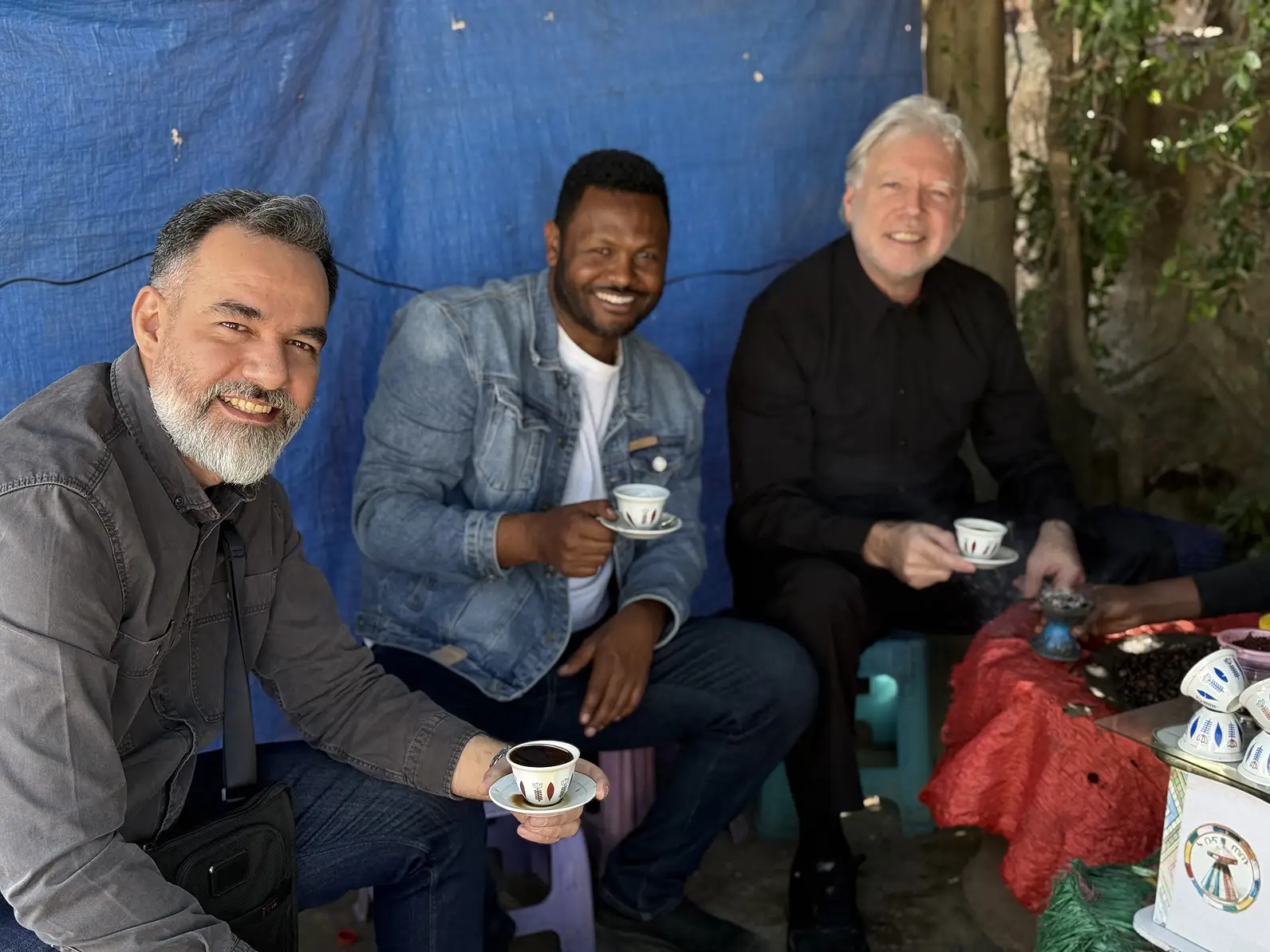 Alene Zewdu sharing Ethiopian coffee with travelers on a Lalibela Expeditions tour