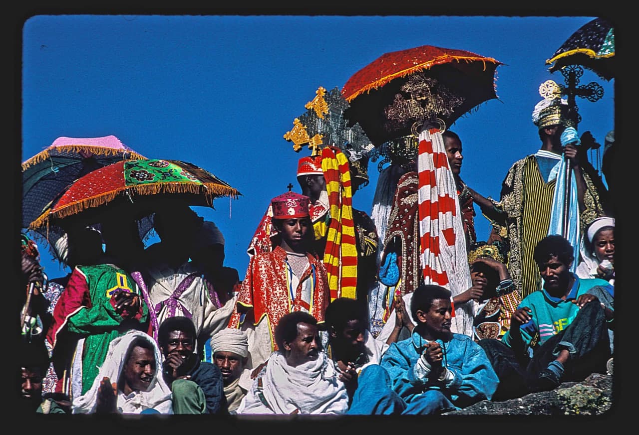 Priests with ceremonial umbrellas during Timkat